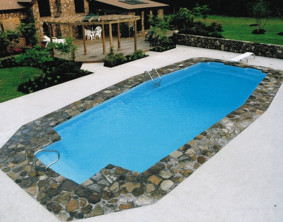 Stunning in-ground fiberglass seamless pool by Catalina Pools